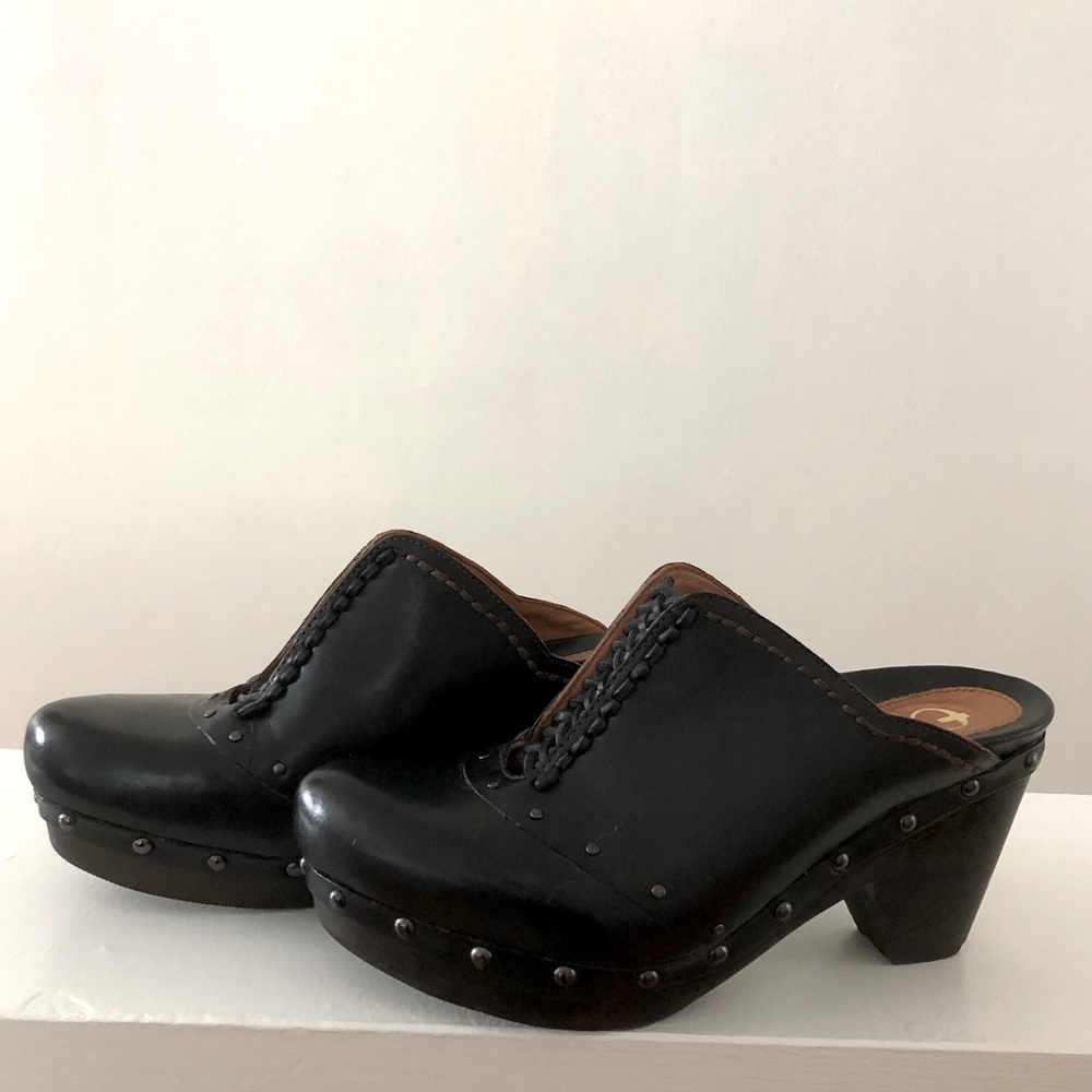 Black leather clogs